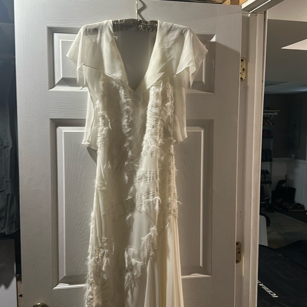 Long cream dress. Size small. Brand new without tags. Never worn.